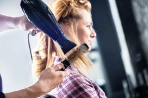 Drying hair at the hairdresser's.