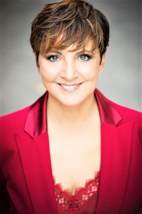 Debora Villa in “Gli uomini vengono da Marte, le donne da Venere”